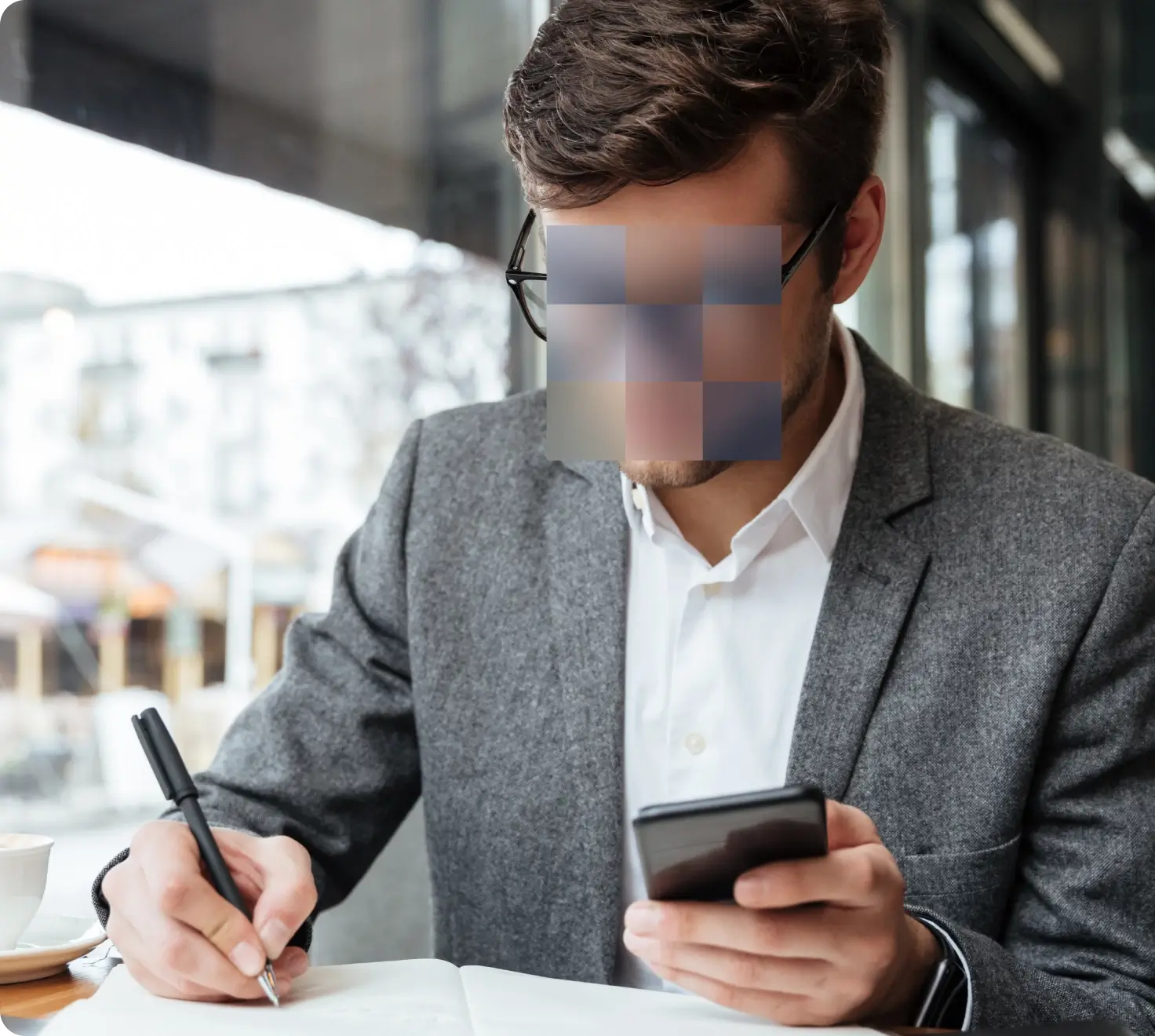 wp-content/uploads/2024/12/smilingbusinessmanblurred.webp